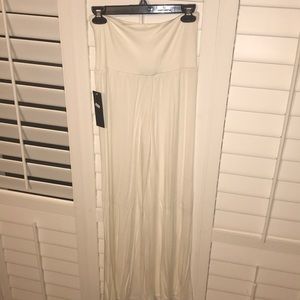 Cream colored, flowy pants NWT NEVER WORN